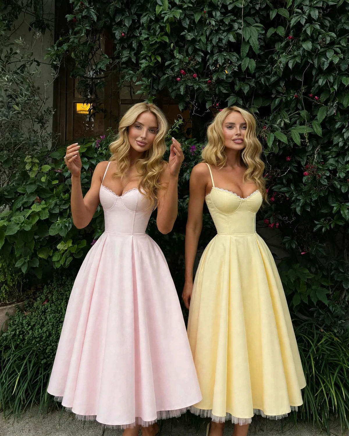 Mirabelle butter yellow sweetheart tulle midi dress shown with the blush colourway - garden setting