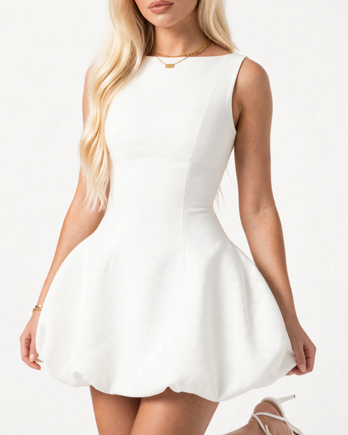 Poppy white mini dress - close-up of boat neck bodice and fitted waist seams