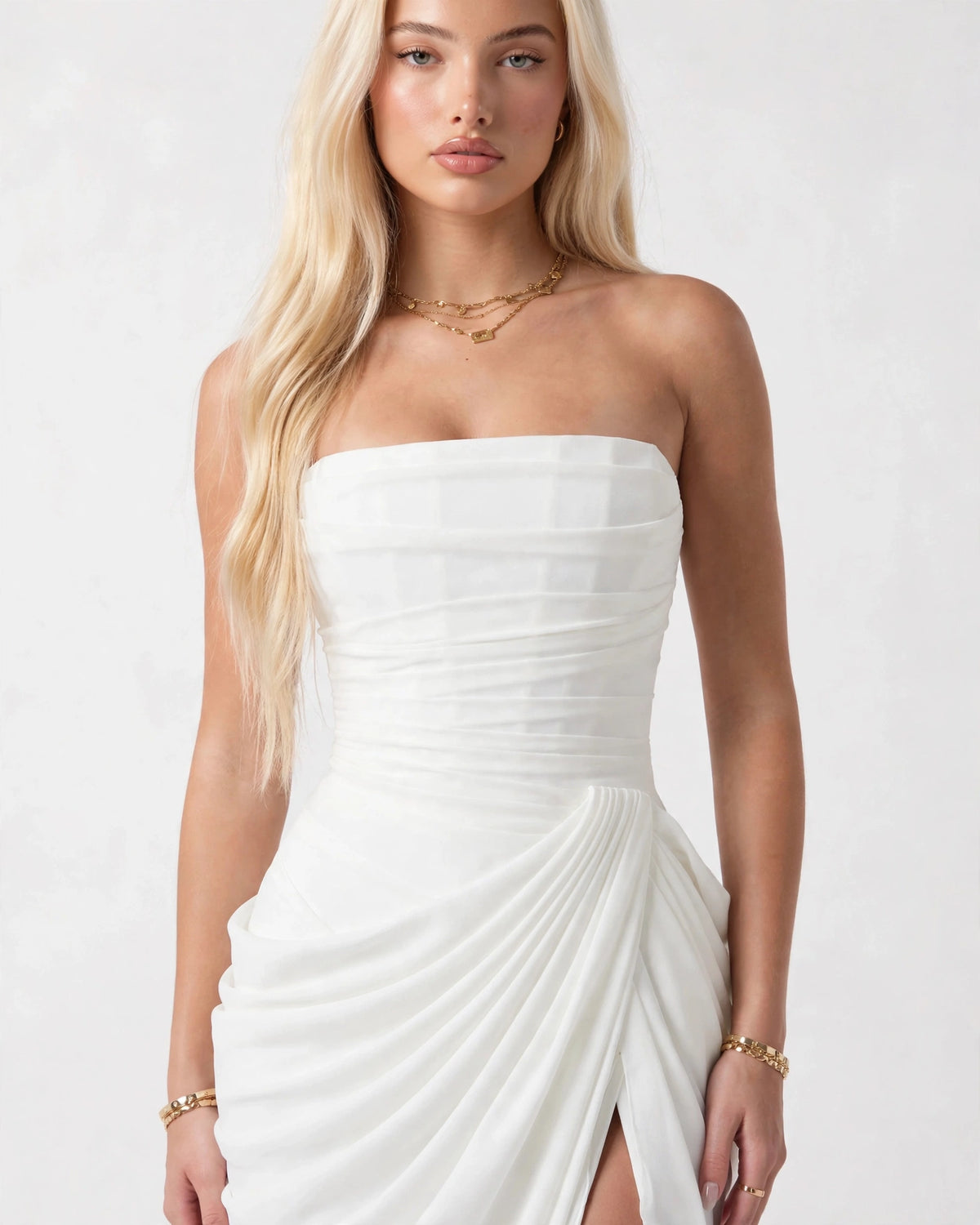 Seraphine white dress sculpted corset bodice and draped waist close-up
