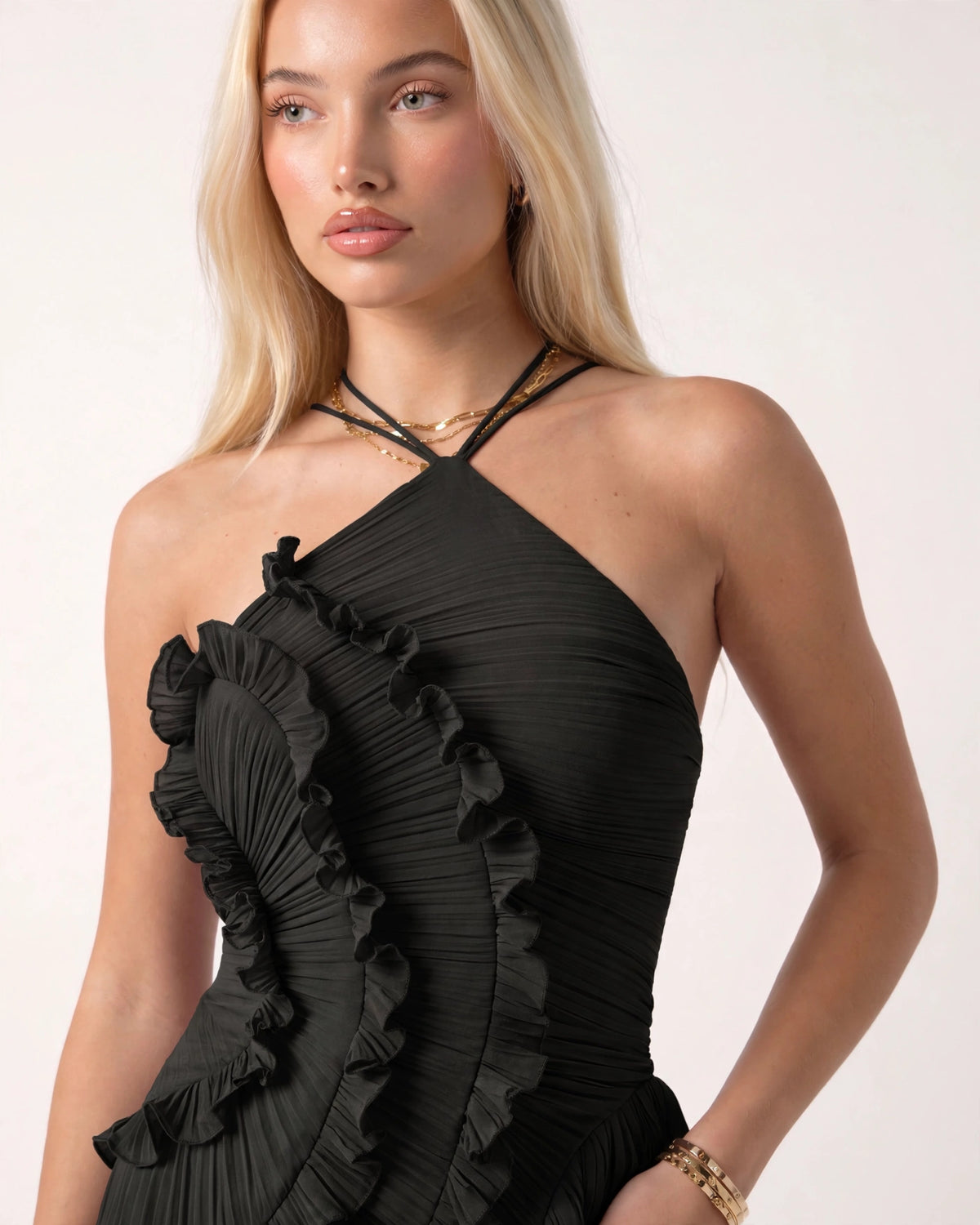 Aveline black dress halter neckline and pleated ruffle bodice detail