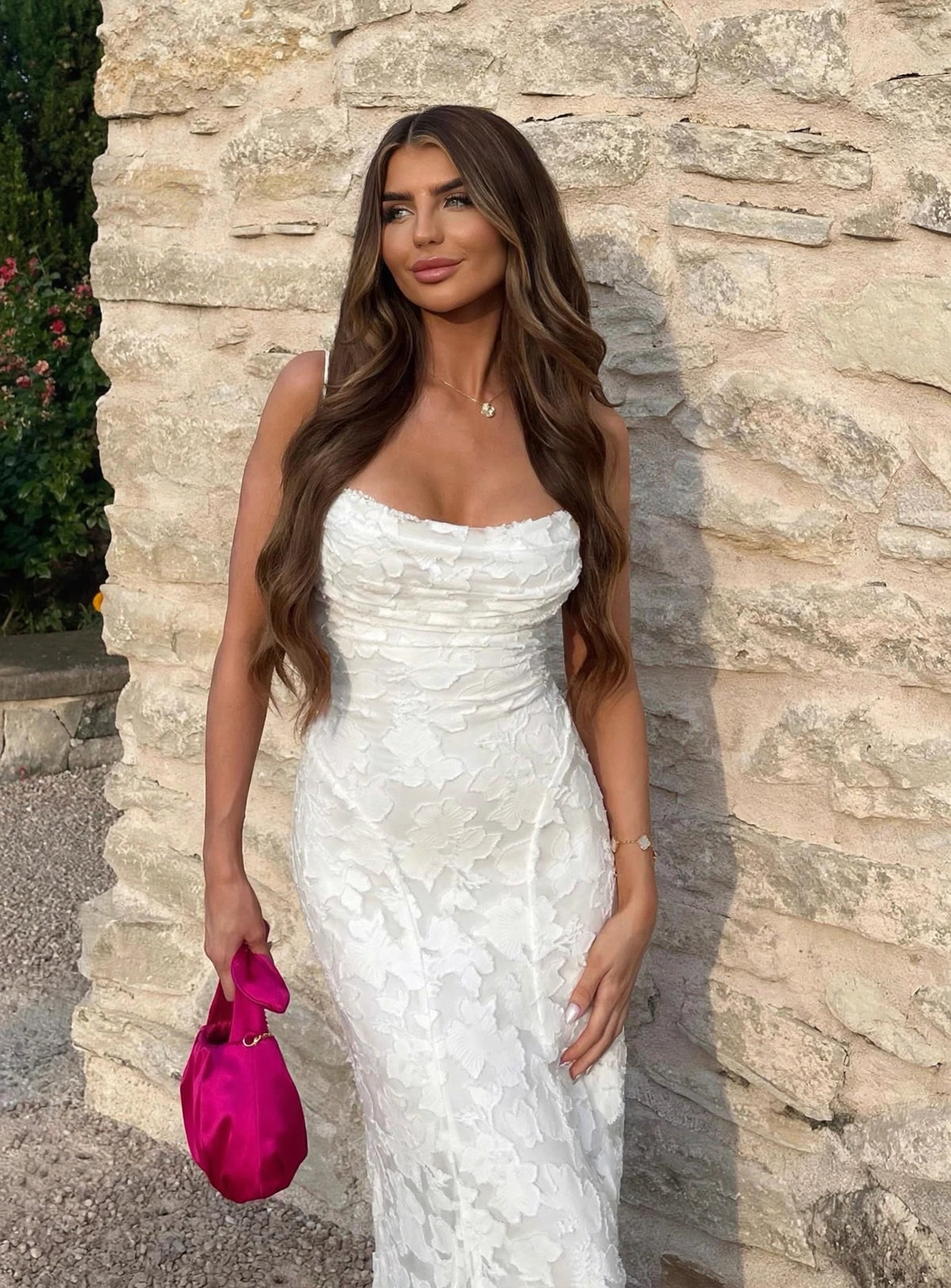 Cecily white draped-neck floral applique A-line maxi dress - front view, outdoor setting