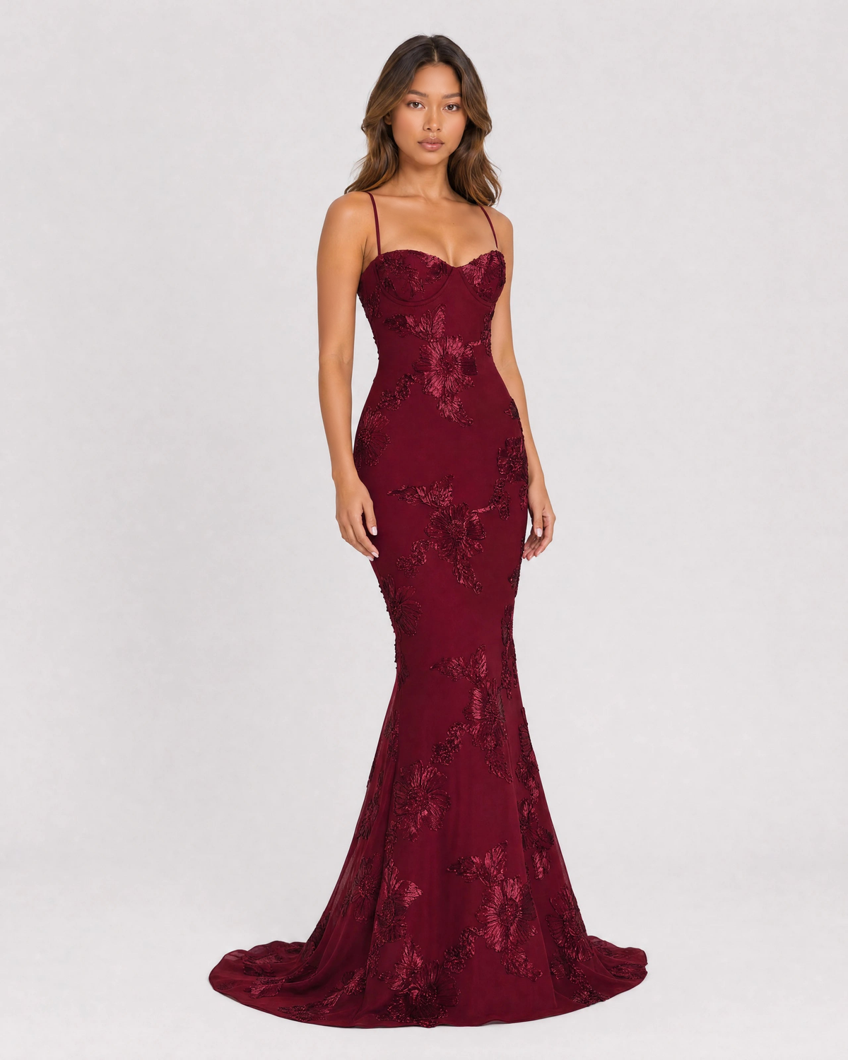 Flora embroidered floral mermaid gown in burgundy, three-quarter front